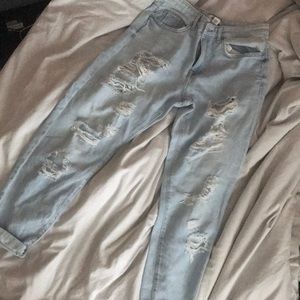 Distressed light washed denim boyfriend jeans
